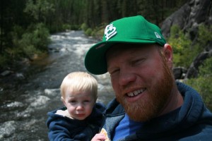 Land and his son Colin on a river in Montana.